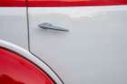 Detail of door on red and white classic American Ford in Habana-Havana-Cuba Art Print
